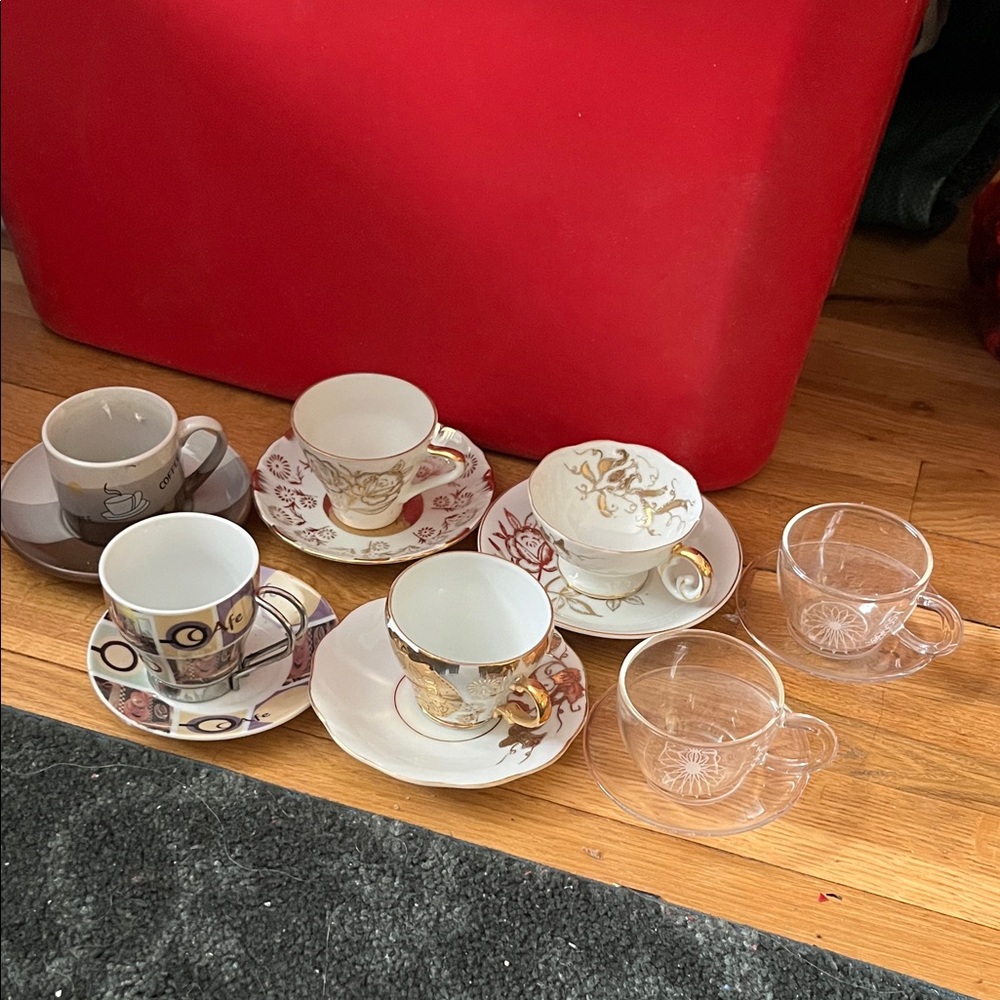 Assorted espresso cups w/matching plates. Great condition